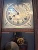 Wall Clock. Chestnut wood wall clock with pendulum. Signs of use.Image - 1