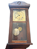 Wall Clock. Chestnut wood wall clock with pendulum. Signs of use.Image - 2