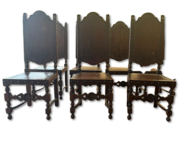 Dining Chairs. Set of 8 antique wooden chairs with leather seats and backs. Signs of wear.