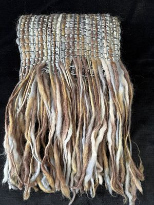 Scarf. Wool and polyester scarf. Signs of use. 
.