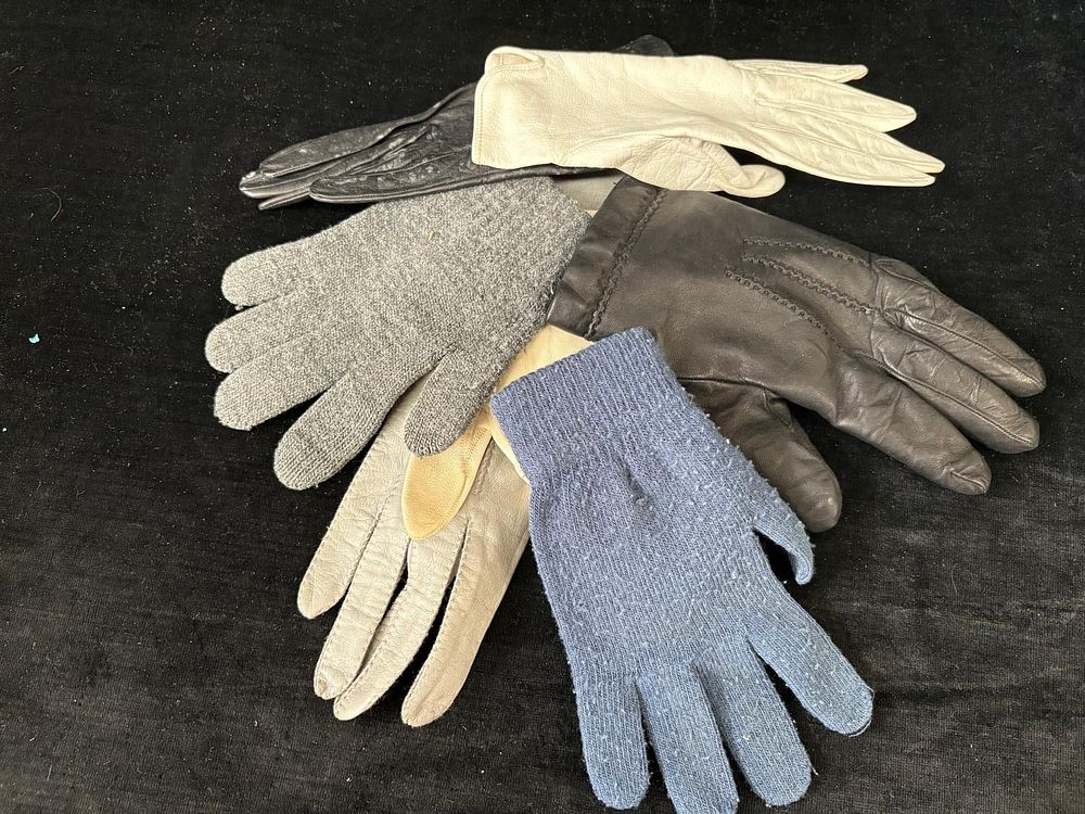 Pair of Gloves Set. Set consisting of 7 unmatched gloves in various colors. Signs of use.