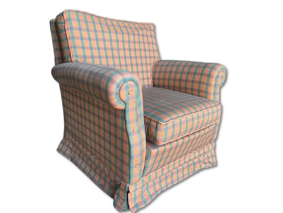 Armchair upholstered in plaid pattern fabric. English style with petticoat.
