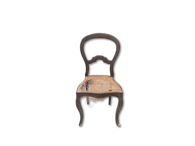 Chair. Antique wooden chair with a straw seat. The straw needs complete restoration. Signs of wear.