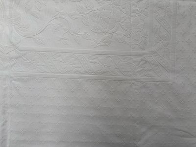 Tablecloth with florets. Signs of use.