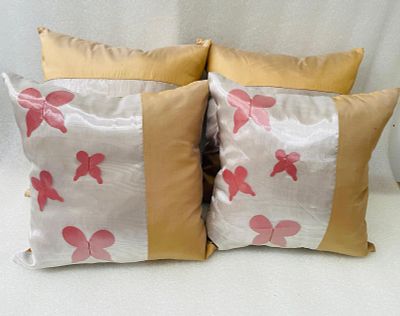 Decorative Cushions. Decorative cushions in natural silk with plush filling.