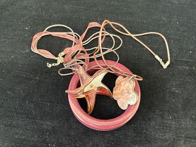 Set of two necklaces and a vintage bracelet. Signs of use.