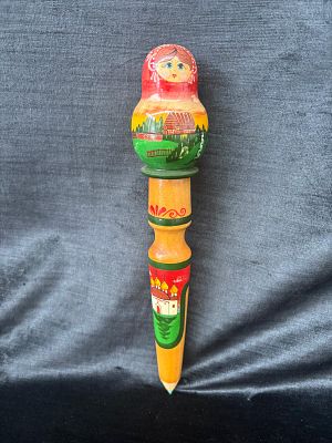 Matryoshkas. A set of matryoshkas consists of a wooden figure, which separates at the middle 