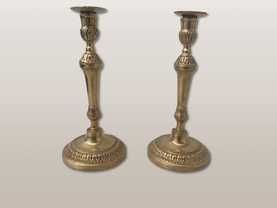 Pair of Bronze Candlesticks. Louis XVI style gilded bronze, French relief and chiselled 19th 