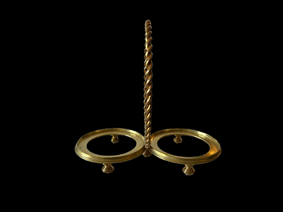 Bottle Support. Brass holder for two bottles. 
Signs of use.