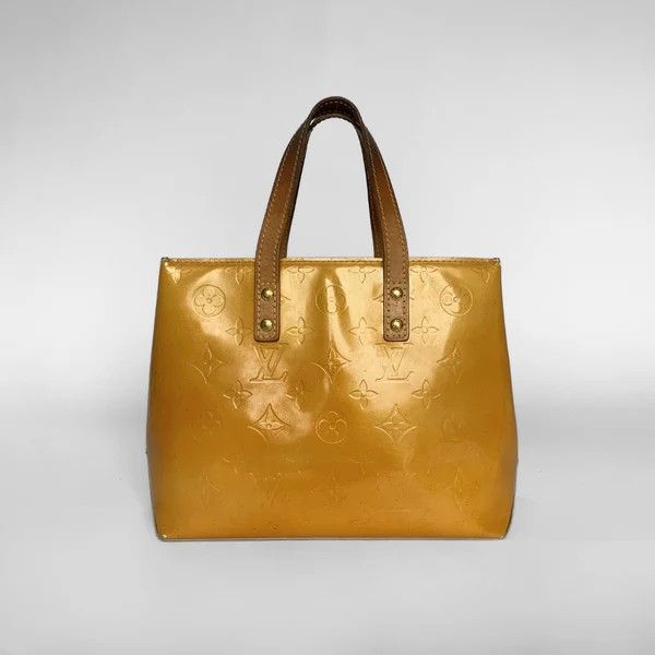 Mala Louis Vuitton Reade Verniz. A mala Louis Vuitton Reade &eacute; feita de pele Vernis 