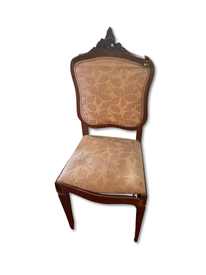 Chair. Mahogany chair with carved detail. Some broken parts. Seat and back upholstered in 