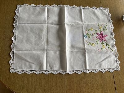 Embroidered Linen Napron. Embroidered linen napkin with lace border. Signs of wear.