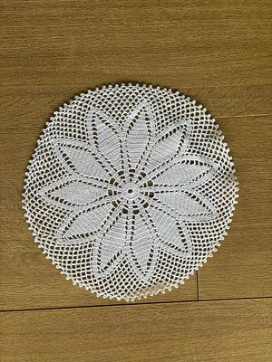 Napron in Lace. Handmade lace doily for a side table or headboard in a circular shape with a 