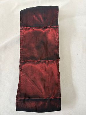 Silk ribbon. Signs of wear.