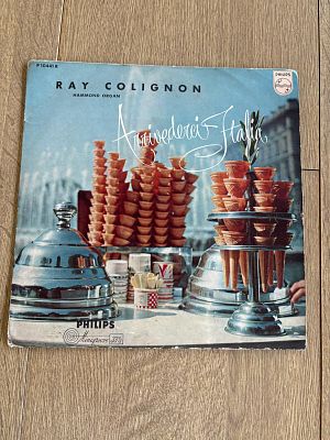 Vynil Record Vintage. Vintage vinyl record by Ray Colignon "Arrivederci Italia". Signs of use.