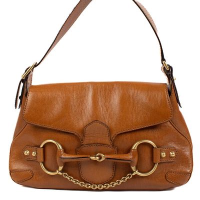 Gucci Camel Horsebit Shoulder Bag. The Gucci Camel Horsebit Shoulder Bag is a refined statement 