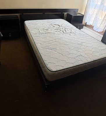 Vintage bed with two Bedside tables. Vintage black MDF bed with two built-in nightstands. Each 