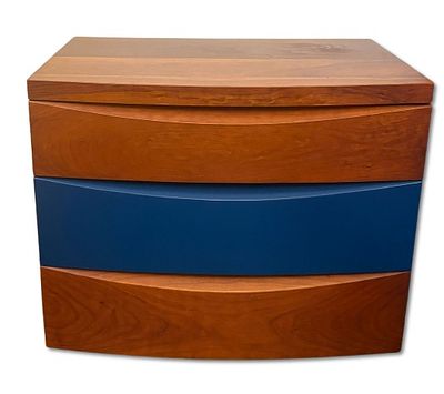 Bedside Table. Cherry wood nightstand with upholstered central drawer front. Contains 3 drawers. 