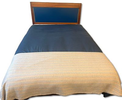 Headboard & Base. Cherry wood headboard with fabric front panel. Upholstered bed base in 