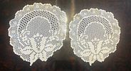 Lace Cloths. Handmade lace cloths in a circular shape. Signs of use.Image - 1
