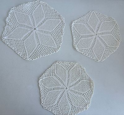 Lace Cloths. Set of 3 handmade lace cloths, circular in shape. Signs of use.