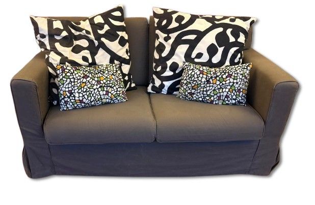 2 - Seater Sofa. Two-seater English-style sofa in fabric. Includes 4 decorative cushions with 