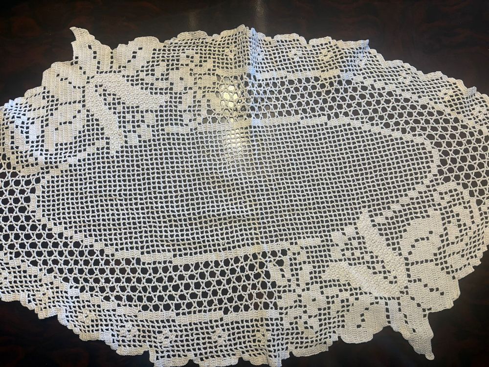 Lace Fabric. Lace fabric with oval floral motifs. Signs of wear.