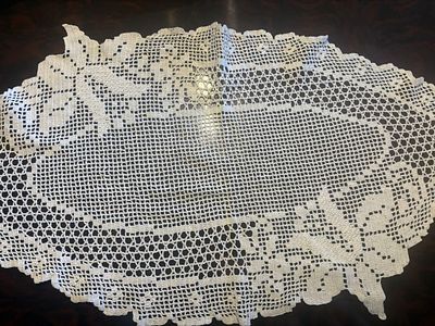 Lace Fabric. Lace fabric with oval floral motifs. Signs of wear.