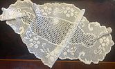 Lace Fabric. Lace fabric with oval floral motifs. Signs of wear.Image - 2