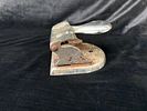 Vintage Stapler. Vintage stapler made of very old and heavy metal. Signs of wear and rust.Image - 1