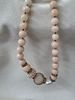 Necklace with pink stones, beads, and gold details. Signs of wear.Image - 2