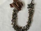 Necklace. Vintage necklace with beads and a tulle rose appliqu&eacute;. Signs of wear.Image - 1