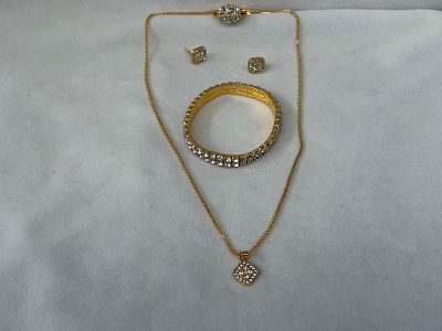 Set of Ring, Necklace, Bracelet and Earings. Set consisting of a ring, bracelet, necklace, and 