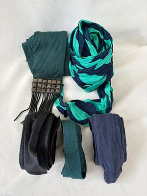 Belt Set. Set consisting of 5 belts. Two are mesh, one is fabric, and one is leather. Signs of use.