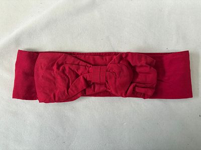 Fabric Belt. Fabric belt with decorative bow. With clasps/eyes. Signs of wear.
