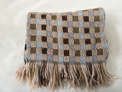 Scarf. Wool scarf with geometric pattern and fringe. Signs of wear.