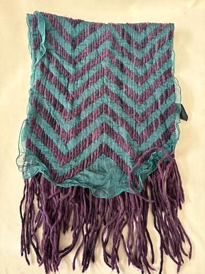 Scarf. Silk, wool and polyester scarf with fringe. Signs of use.