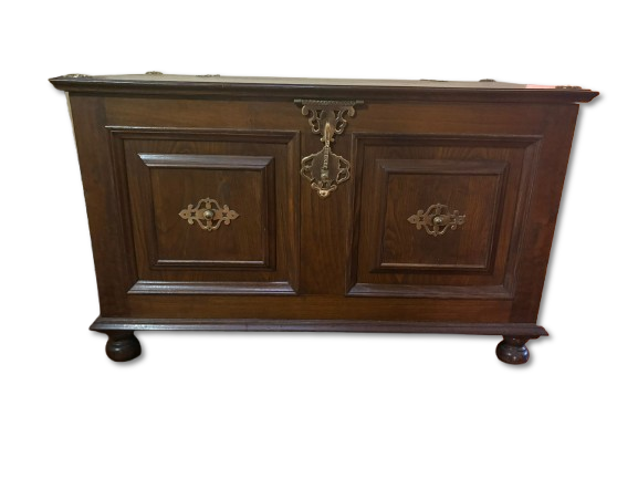 Wood Storage. Wooden storage chest with metal hardware. Signs of use.