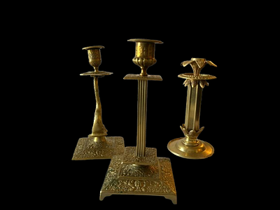Candle Holders. Set consisting of 3 units of bronze candlesticks. 
French 
Sec. XIX. 
Signs of 