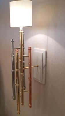 Wall Lamp. Set of two wall sconces in brass, stainless steel, and bronze. Mounted on Estremoz 
