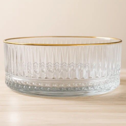 Glass Bowl. Glass goblet with a gold rim.