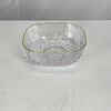 Bowl. Plastic bowl with a glass effect and a gold rim.Image - 2