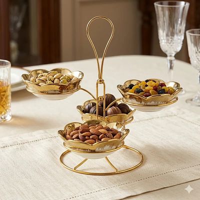 Set of 4 Gold Ceramic Bowls with Metal Stand. Set of 4 white ceramic bowls with gold details. 