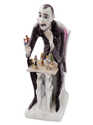MEISSEN & ШТРАНГ Питер
&laquo;Коллекционер&raquo;
1972−2008 гг. (по клейму)
Фарфор, роспись
36 х 26 х 12 см 