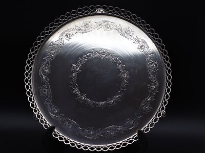 Small Portuguese silver salver with a latticework rim and decoration in a neo-classical revival 