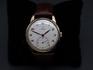 OMEGA - ‘Classic’ model wristwatch, c. 1950. Manual winding. 
Gold-plated case. 
With papers. Image - 1