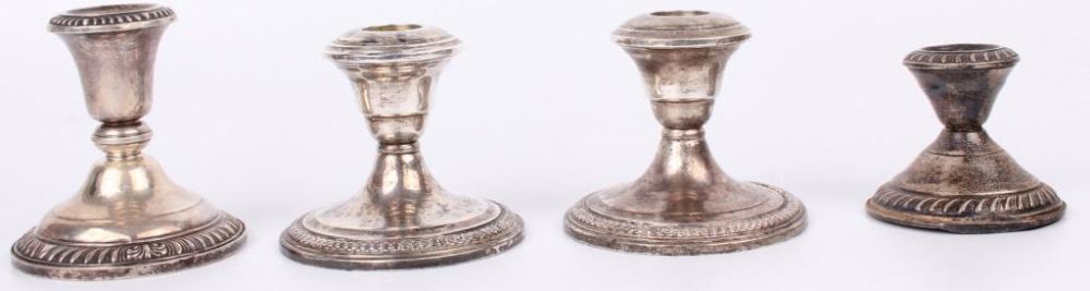 Lot 11570: WEIGHTED STERLING SILVER CANDLE HOLDERS - (4)