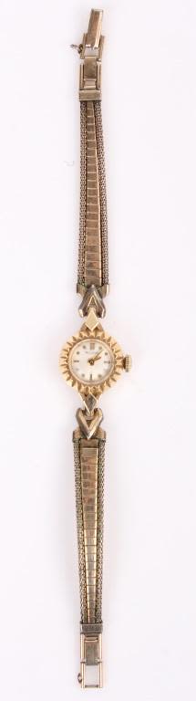 Lot 11676: 14K YELLOW GOLD WOMEN'S BULOVA WRISTWATCH