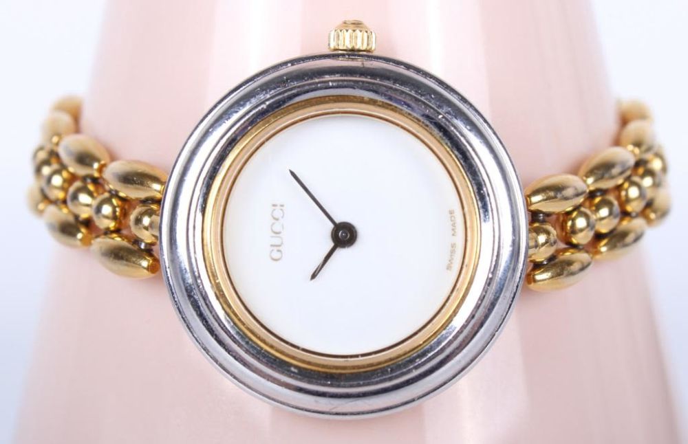Lot 11677: GUCCI 11/12.2 GOLD PLATE INTER. BEZEL LADIES WATCH