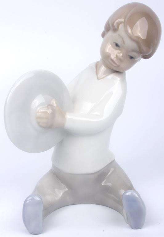 Lot 11712: LLADRO 1969 BOY W/ CYMBALS PORCELAIN FIGURE
